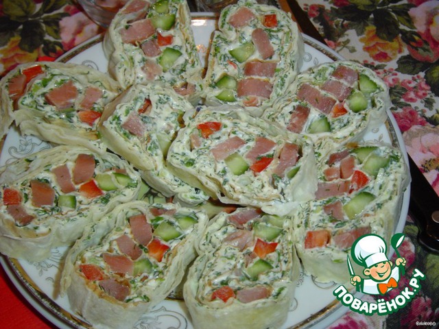 Roll of pita bread with salmon