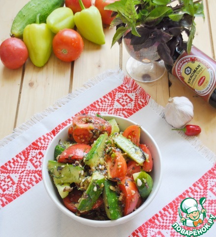 Appetizer of pickled tomatoes and cucumbers