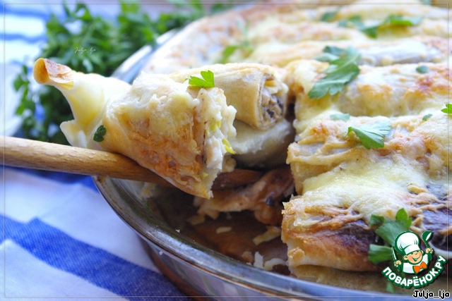 Pancake pie with chicken and mushrooms