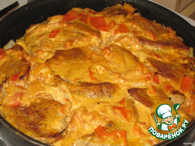 Meat with potatoes in a creamy tomato sauce