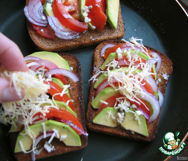 Warm sandwiches with avocado, tomatoes and cheese