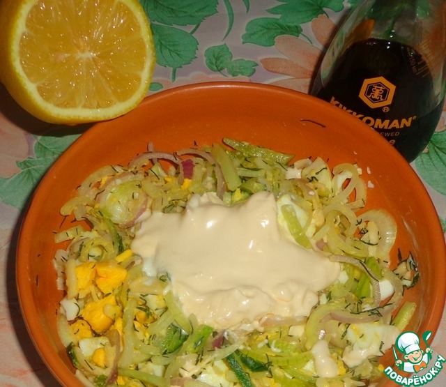 Onion salad with egg and cucumber