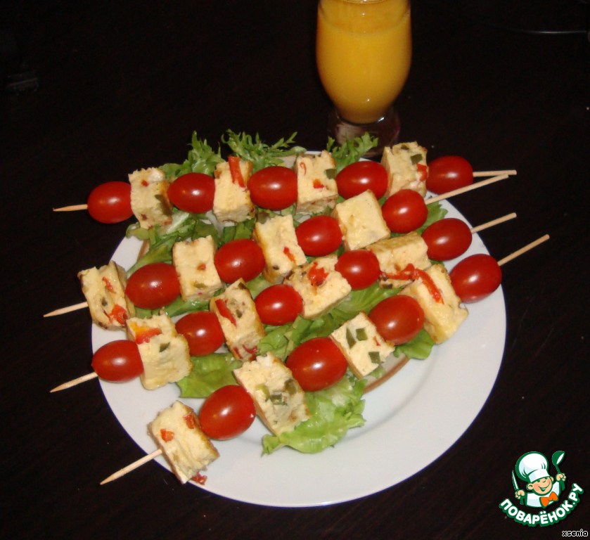 Festive omelette with cheese and sweet peppers on skewers
