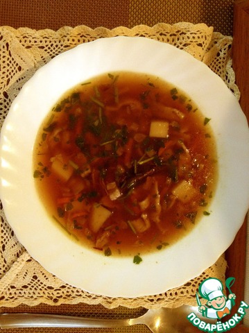 Vegetable soup with homemade noodles and mushrooms
