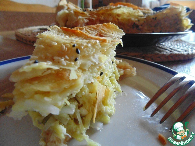 Pie with zucchini and pita bread