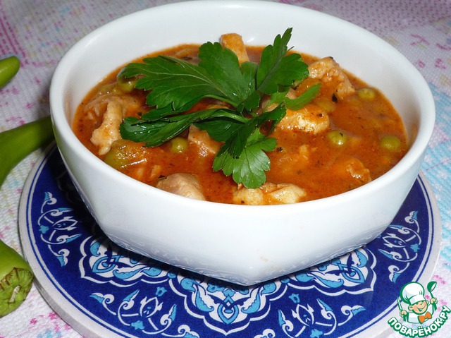 Stew of chicken with green peas