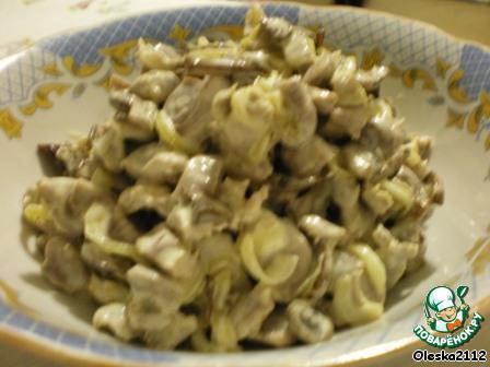 Salad of chicken gizzards with mushrooms