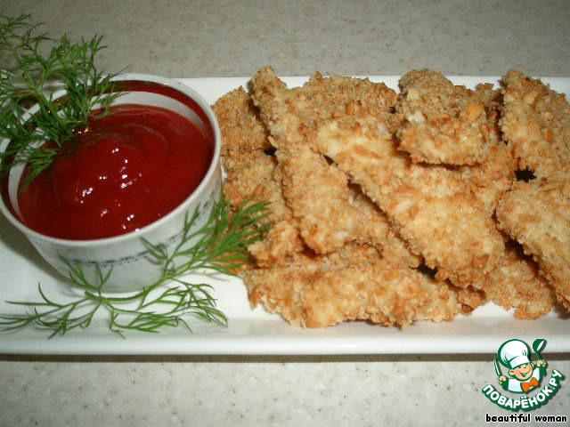 Chicken fillet coated in almonds and Graham crackers