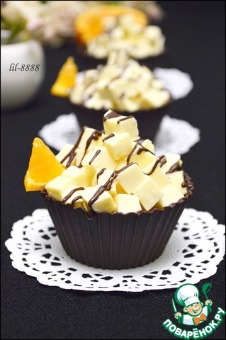 Chocolate basket with lemon confit and orange jelly