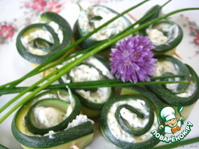 Zucchini rolls with cheese and greens
