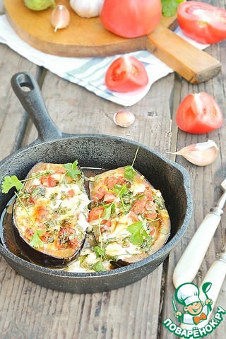 Eggplant stuffed with tomato and cheese
