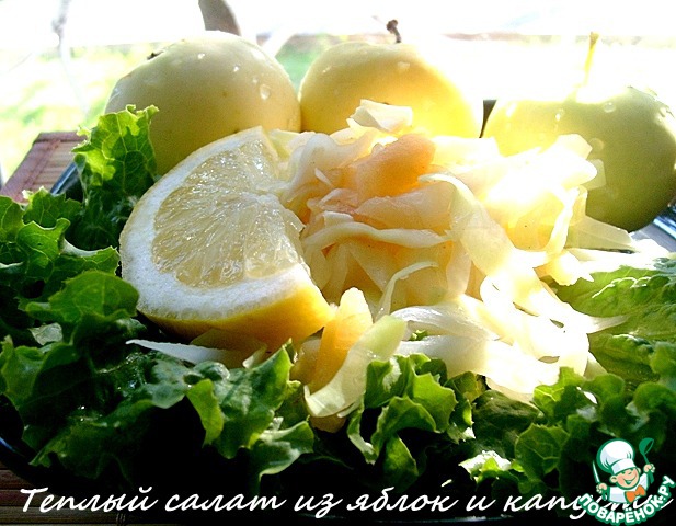 Warm salad with apples and cabbage