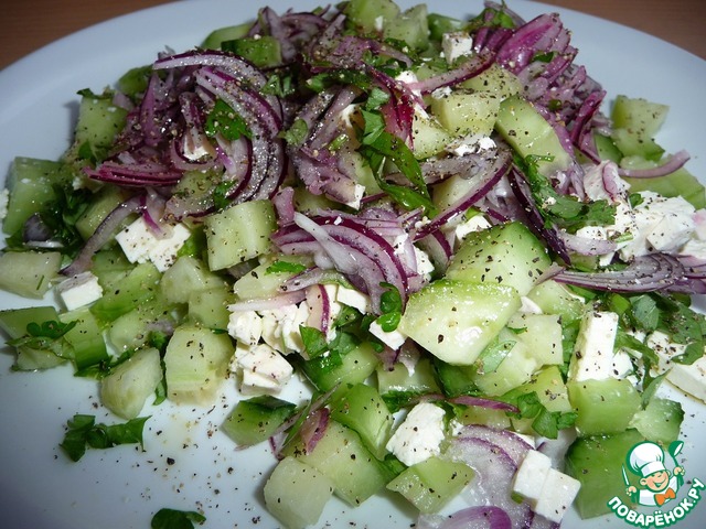 Cucumber salad with feta and onions