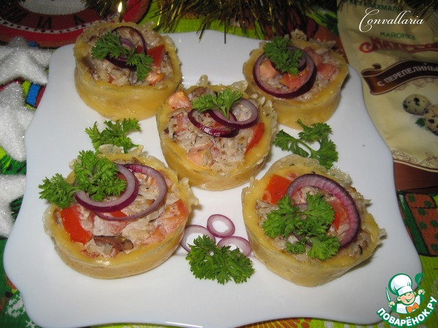 Cheese baskets with sprats