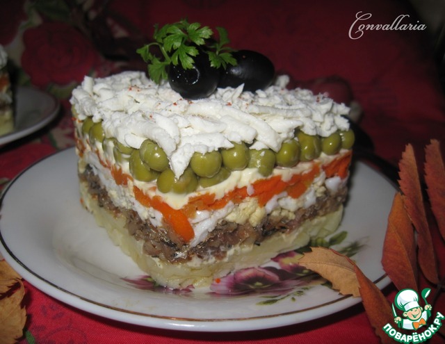 Salad of sprats with vegetables and cheese