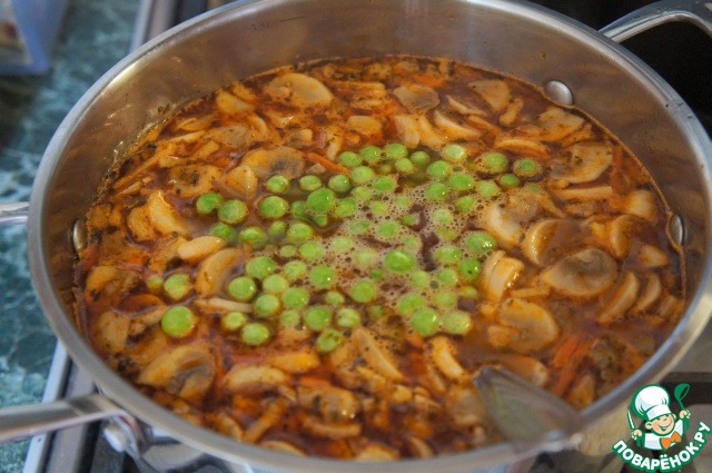 Soup of pork with mushrooms and peas