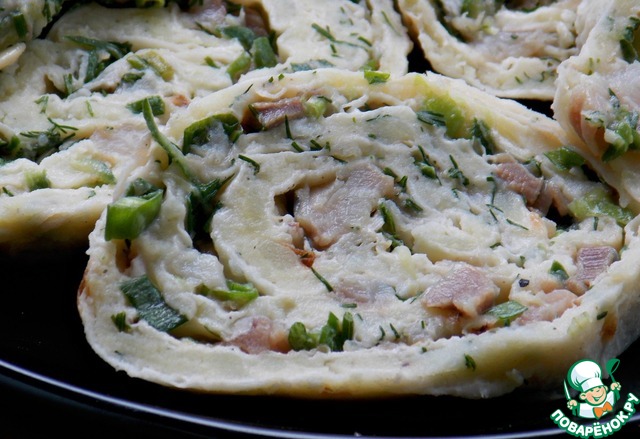 Potato rolls with herring in a pita