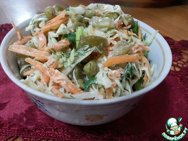 Cabbage salad and pickled cucumbers