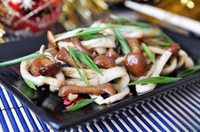 Appetizer of squid and mushrooms 