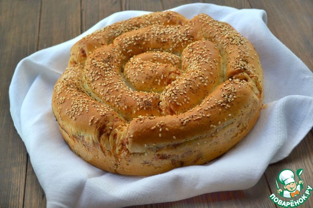 Portioned cake with cheese and sausage