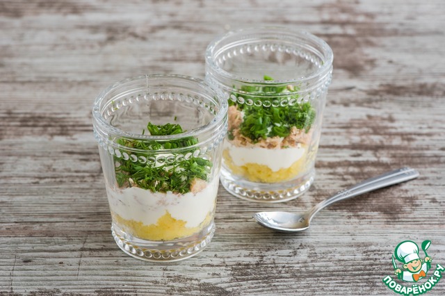 Layered salad with canned salmon