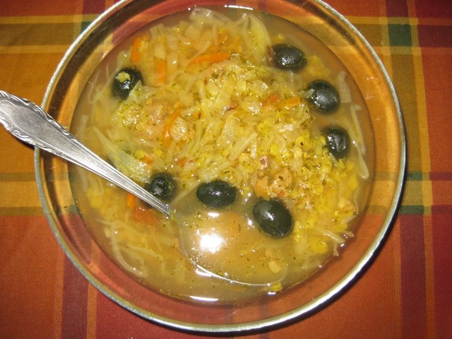 Non-traditional sour soup with lentils and olives