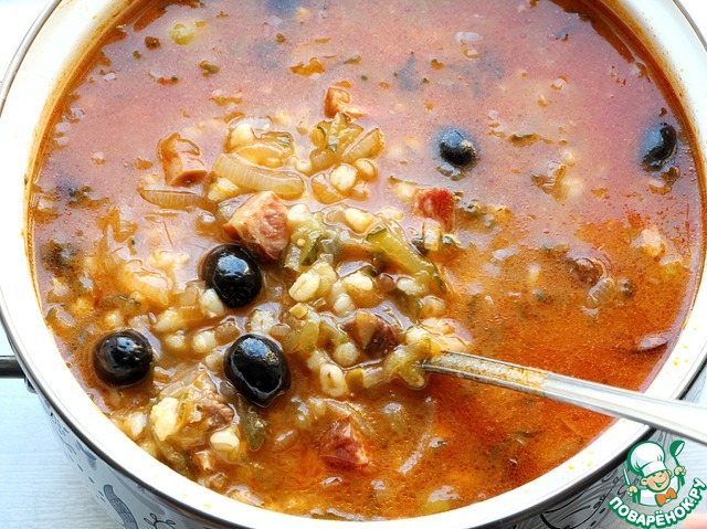 Soup Solyanka with smoked meat and pearl barley