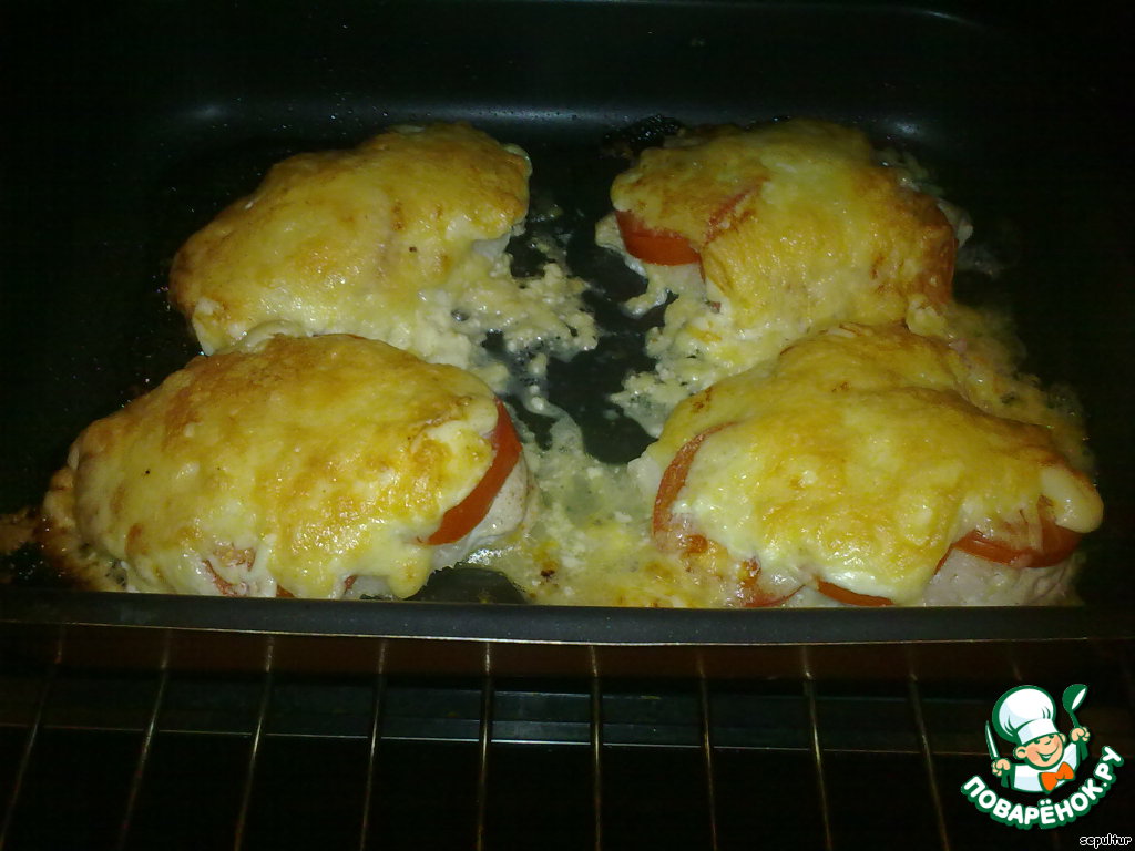 Steak chicken fillet with tomatoes and cheese