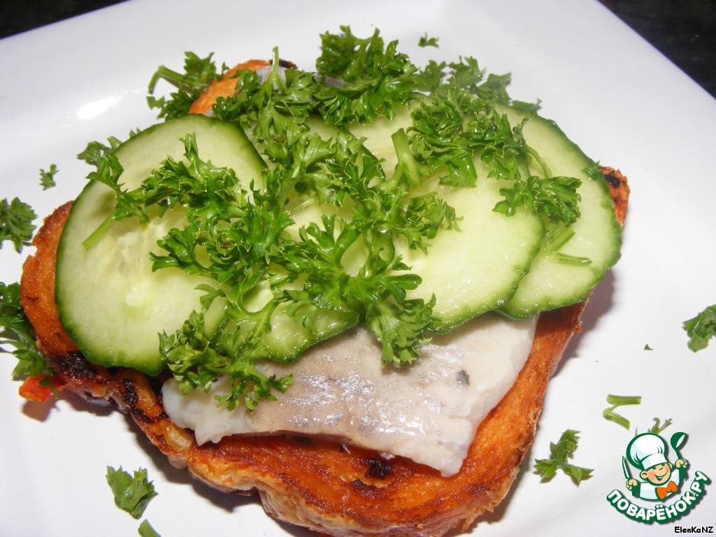 Sandwiches with herring and cucumber