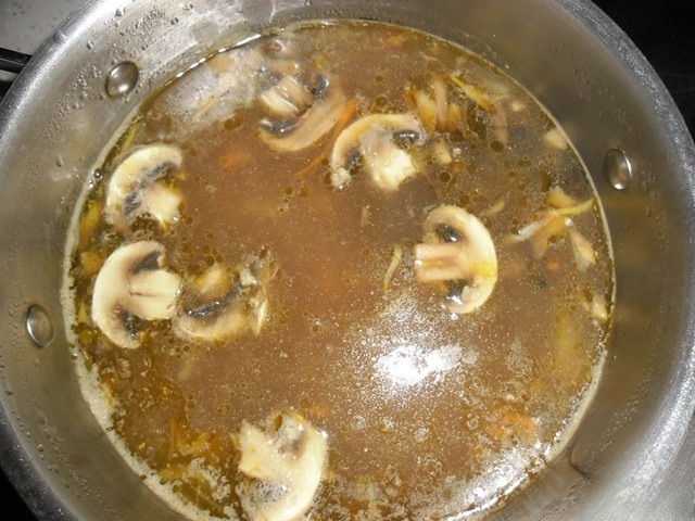 Soup with dried mushrooms, fresh mushrooms and cereals