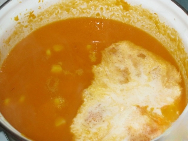 Pumpkin soup with bacon and corn