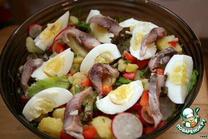 Salad with herring and egg