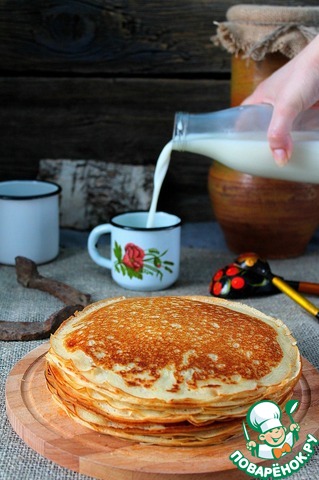 Simple yeast pancakes on milk