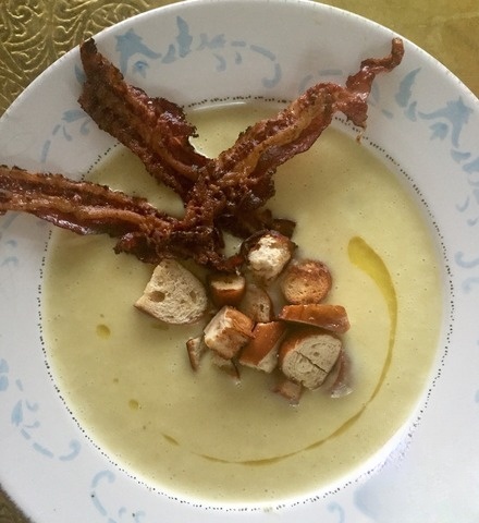 Potato soup with croutons and bacon