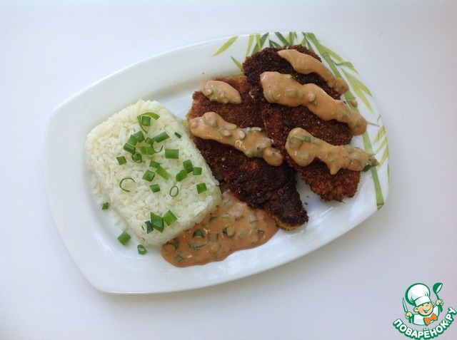 Chicken schnitzel in crispy breadcrumbs