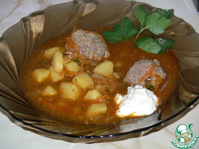 Soup of sauerkraut with meatballs