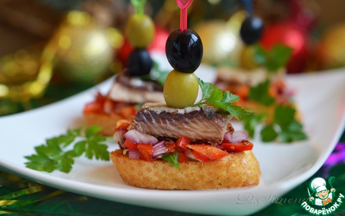 Crostini with marinated salad and sardines