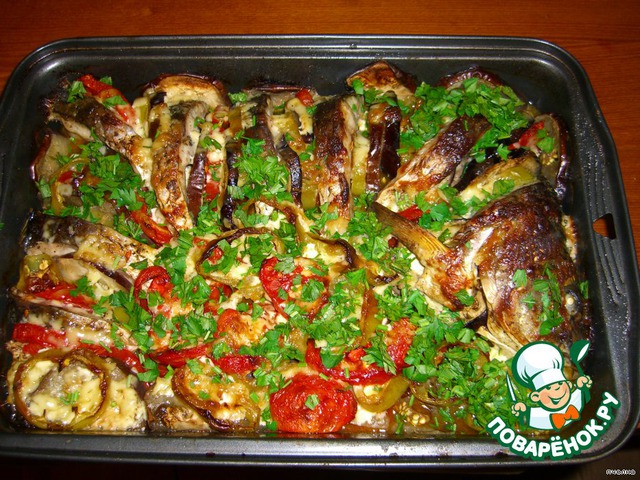 Carp baked with vegetables