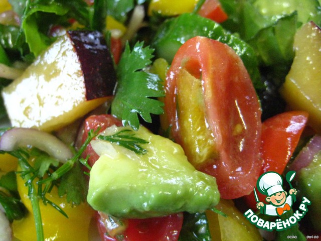 Vegetable salad with plums and avocado