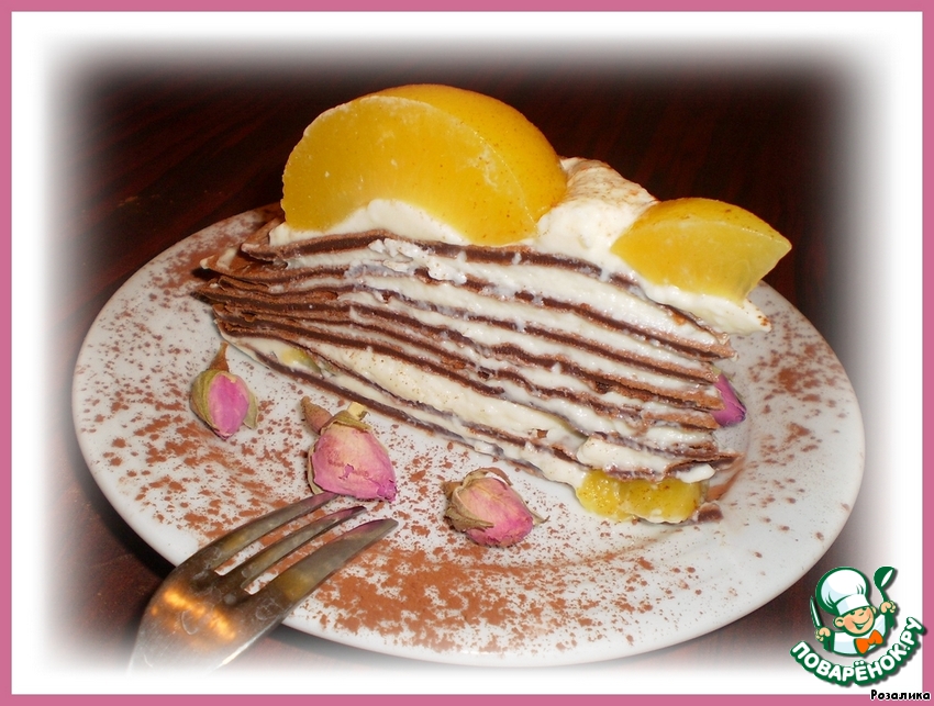 Pancake chocolate cake with peach cream