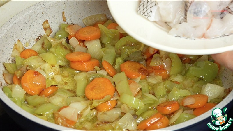 Fish with vegetables in the pan