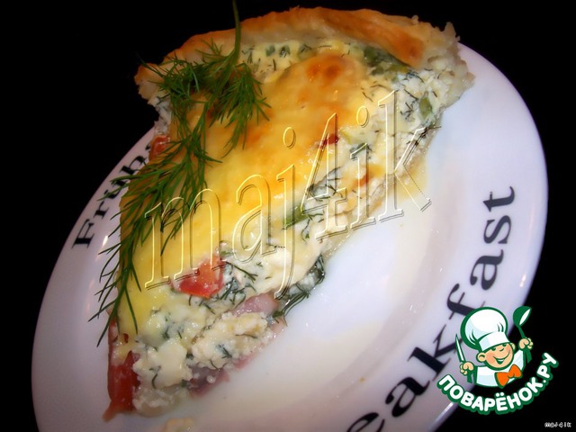 Cheese and cream quiche-souffle with tomatoes and bacon