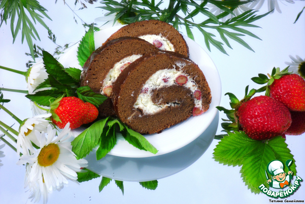 Chocolate roulade with whipped cream and berries