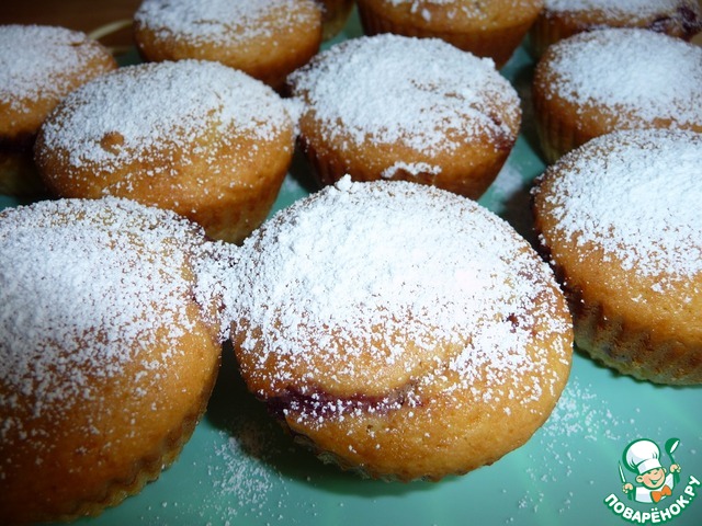 Muffins with cherry jam