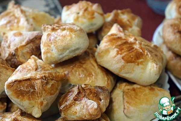 Pies of puff pastry with fish