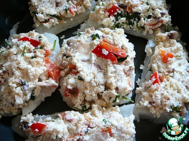 Fish, baked under a bread crust with cheese