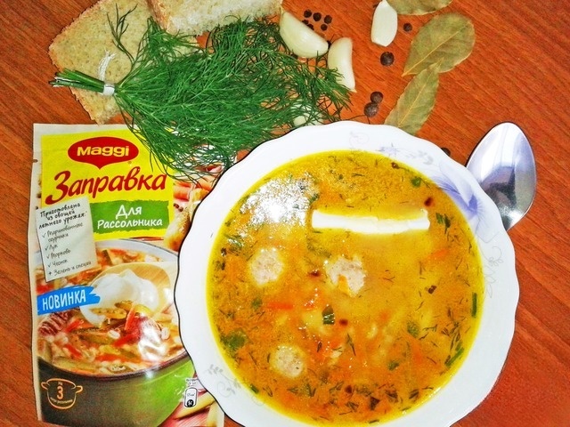 The pickle soup with meatballs and dressing