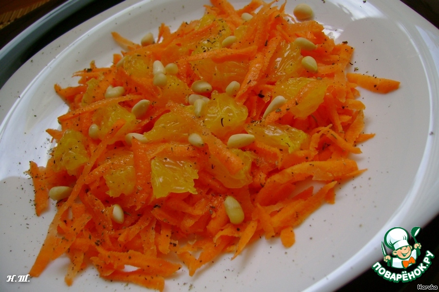 Carrot salad with orange and pine nuts