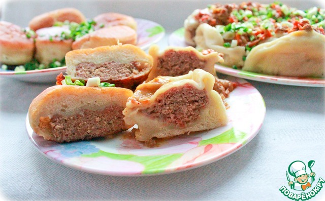 Dumplings with minced meat and gravy in a slow cooker