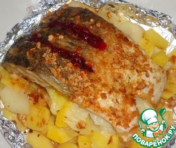 Fish baked in foil with potatoes